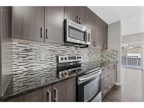 42 Redstone Manor Ne, Calgary, AB - Indoor Photo Showing Kitchen With Upgraded Kitchen