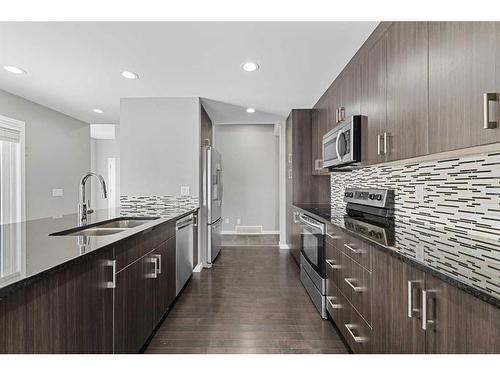 42 Redstone Manor Ne, Calgary, AB - Indoor Photo Showing Kitchen With Stainless Steel Kitchen With Double Sink With Upgraded Kitchen