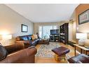 447 Hendon Drive Nw, Calgary, AB  - Indoor Photo Showing Living Room 