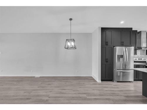 360 Dawson Drive Drive, Chestermere, AB - Indoor Photo Showing Kitchen With Stainless Steel Kitchen