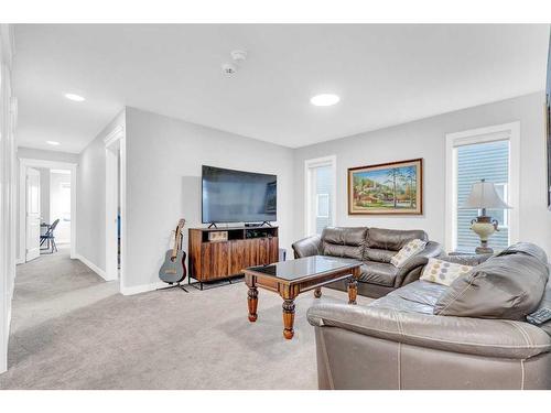 2137 Ravensdun Crescent Se, Airdrie, AB - Indoor Photo Showing Living Room