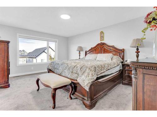 2137 Ravensdun Crescent Se, Airdrie, AB - Indoor Photo Showing Bedroom