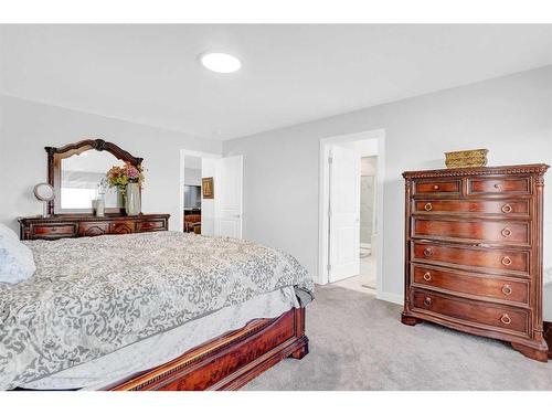 2137 Ravensdun Crescent Se, Airdrie, AB - Indoor Photo Showing Bedroom