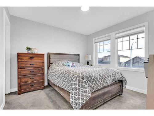 2137 Ravensdun Crescent Se, Airdrie, AB - Indoor Photo Showing Bedroom