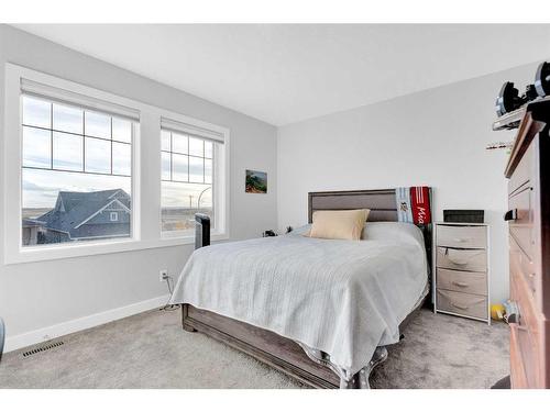 2137 Ravensdun Crescent Se, Airdrie, AB - Indoor Photo Showing Bedroom