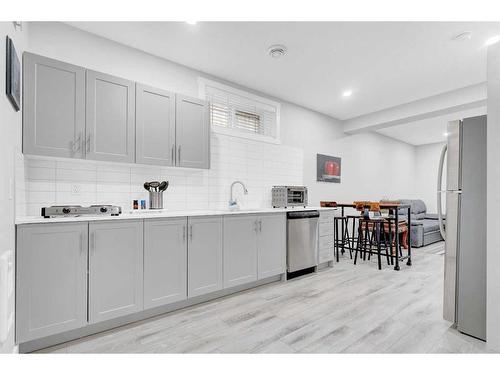 2137 Ravensdun Crescent Se, Airdrie, AB - Indoor Photo Showing Kitchen