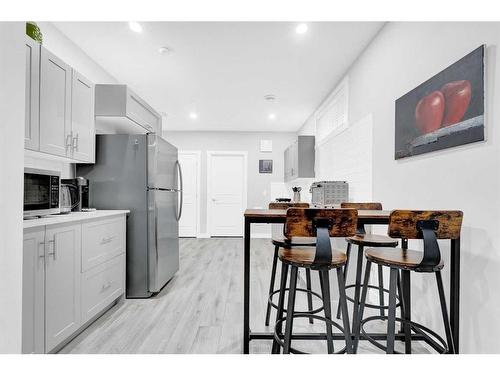 2137 Ravensdun Crescent Se, Airdrie, AB - Indoor Photo Showing Kitchen