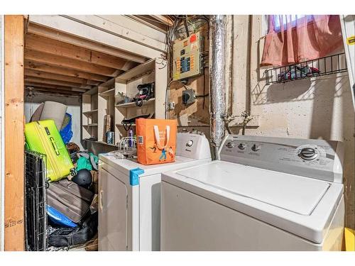 1016 Woodview Crescent Sw, Calgary, AB - Indoor Photo Showing Laundry Room