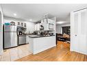 1016 Woodview Crescent Sw, Calgary, AB  - Indoor Photo Showing Kitchen 