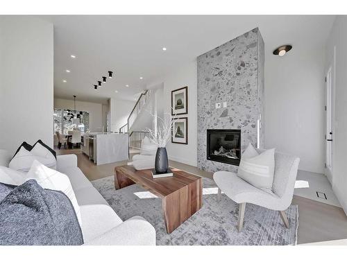 1033 Regal Crescent Ne, Calgary, AB - Indoor Photo Showing Living Room With Fireplace