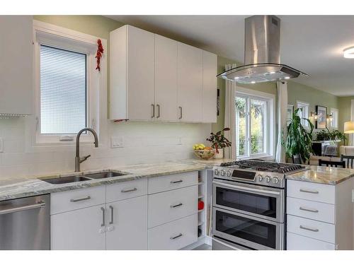 311 7 Avenue Ne, Calgary, AB - Indoor Photo Showing Kitchen With Double Sink With Upgraded Kitchen