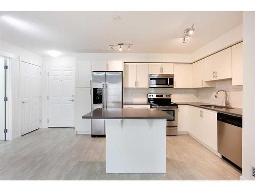 4313-99 Copperstone Park Se, Calgary, AB - Indoor Photo Showing Kitchen With Stainless Steel Kitchen