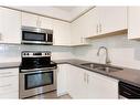 4313-99 Copperstone Park Se, Calgary, AB  - Indoor Photo Showing Kitchen With Stainless Steel Kitchen With Double Sink With Upgraded Kitchen 