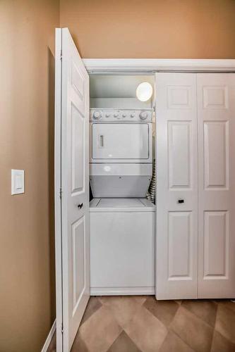 37 Christie Gardens Sw, Calgary, AB - Indoor Photo Showing Laundry Room