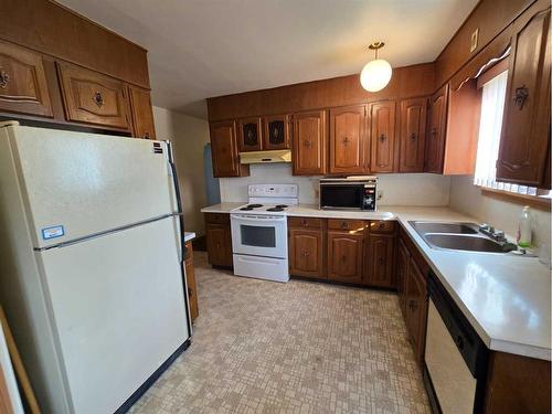 2609 5 Avenue Nw, Calgary, AB - Indoor Photo Showing Kitchen With Double Sink