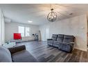 2319-6118 80 Avenue Ne, Calgary, AB  - Indoor Photo Showing Living Room 