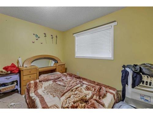 14 Saddlemont Manor Ne, Calgary, AB - Indoor Photo Showing Bedroom