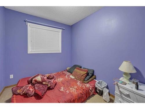 14 Saddlemont Manor Ne, Calgary, AB - Indoor Photo Showing Bedroom