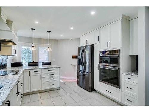 105 Pump Hill Landing Sw, Calgary, AB - Indoor Photo Showing Kitchen With Stainless Steel Kitchen With Upgraded Kitchen