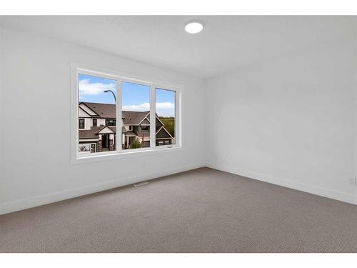 137 Creekstone Hill Sw, Calgary, AB - Indoor Photo Showing Other Room