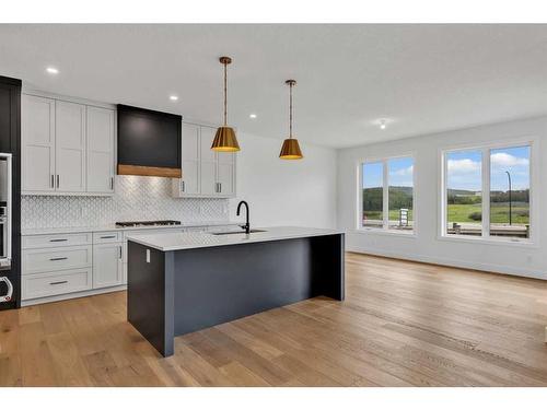 137 Creekstone Hill Sw, Calgary, AB - Indoor Photo Showing Kitchen With Upgraded Kitchen