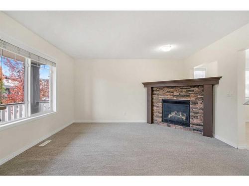 83 Bridlecrest Manor Sw, Calgary, AB - Indoor Photo Showing Other Room With Fireplace