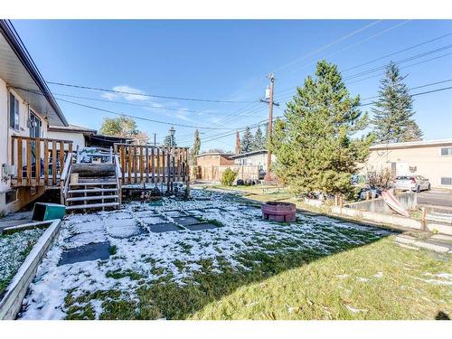 20 Rossburn Crescent Sw, Calgary, AB - Outdoor With Deck Patio Veranda