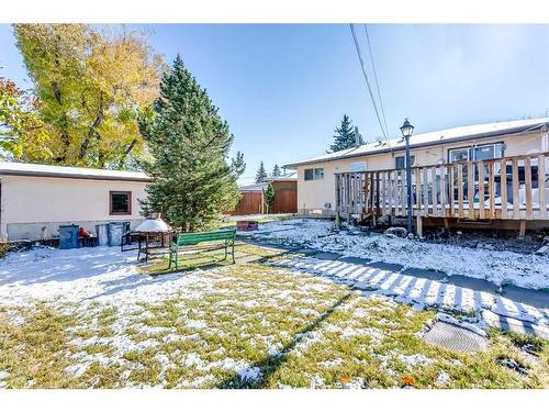 20 Rossburn Crescent Sw, Calgary, AB - Outdoor With Deck Patio Veranda