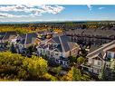 4-59 West Coach Manor Sw, Calgary, AB 