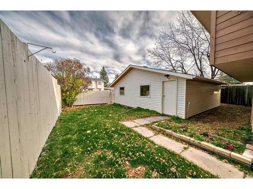 52 Woodfern Rise Sw, Calgary, AB - Outdoor With Exterior