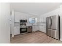 52 Woodfern Rise Sw, Calgary, AB  - Indoor Photo Showing Kitchen With Stainless Steel Kitchen 