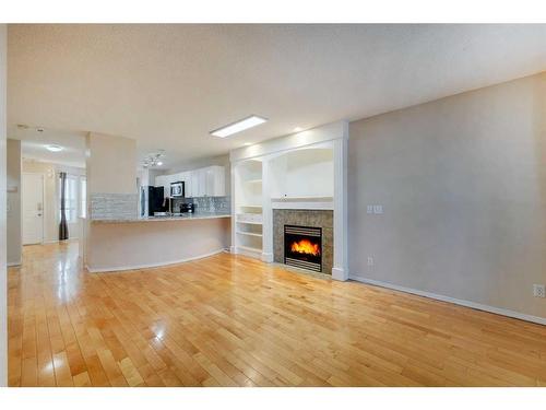 30 Country Village Landing Ne, Calgary, AB - Indoor Photo Showing Living Room With Fireplace