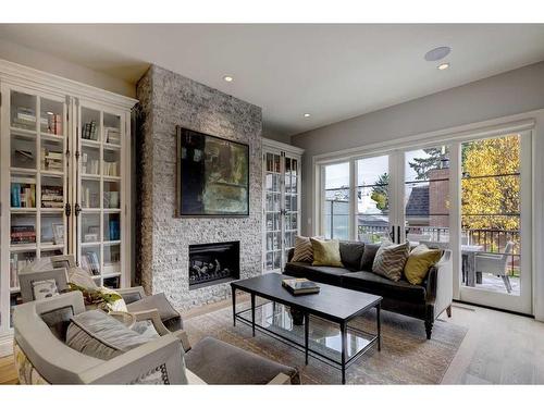 3120 5A Street Nw, Calgary, AB - Indoor Photo Showing Living Room With Fireplace