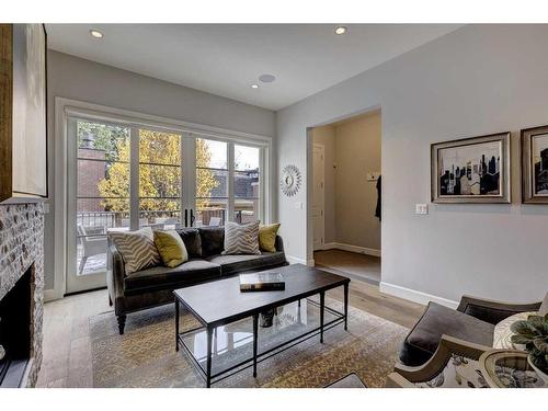 3120 5A Street Nw, Calgary, AB - Indoor Photo Showing Living Room With Fireplace