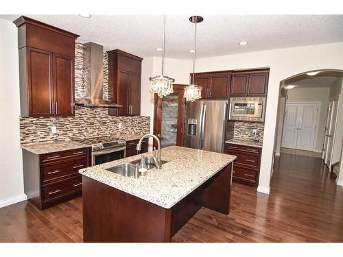 48 Sherwood Gate Nw, Calgary, AB - Indoor Photo Showing Kitchen With Stainless Steel Kitchen With Double Sink With Upgraded Kitchen