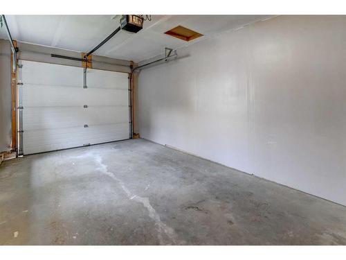 131 Stonemere Place, Chestermere, AB - Indoor Photo Showing Garage