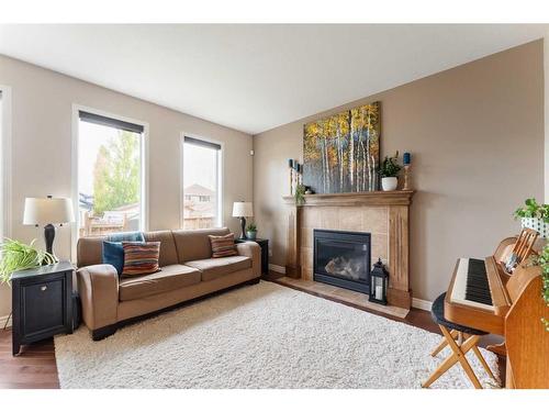 114 Prestwick Terrace Se, Calgary, AB - Indoor Photo Showing Living Room With Fireplace