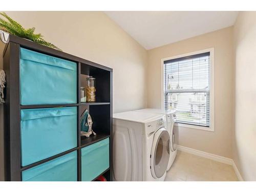 114 Prestwick Terrace Se, Calgary, AB - Indoor Photo Showing Laundry Room