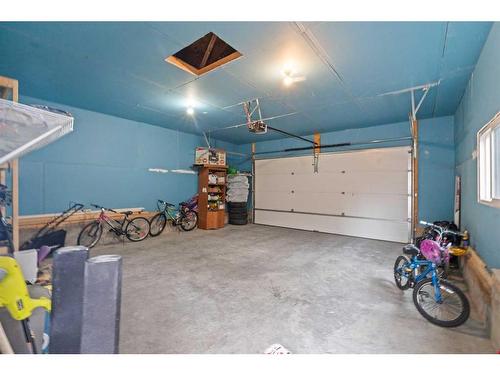 374 Evanston Way Nw, Calgary, AB - Indoor Photo Showing Garage