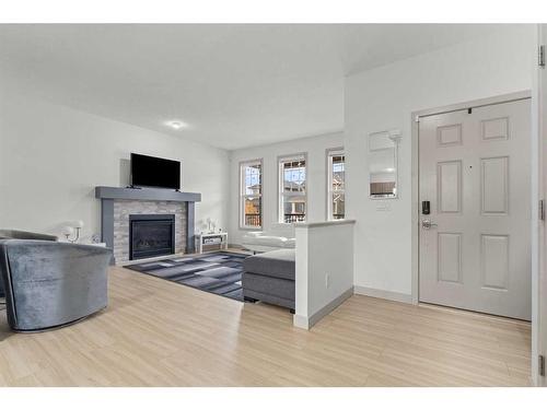 374 Evanston Way Nw, Calgary, AB - Indoor Photo Showing Living Room With Fireplace