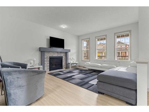 374 Evanston Way Nw, Calgary, AB - Indoor Photo Showing Living Room With Fireplace