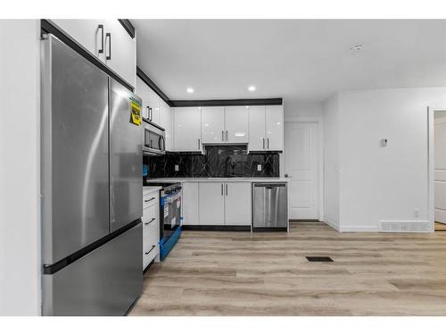 275 Rundlecairn Road Ne, Calgary, AB - Indoor Photo Showing Kitchen With Stainless Steel Kitchen