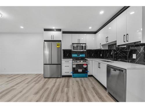 275 Rundlecairn Road Ne, Calgary, AB - Indoor Photo Showing Kitchen With Stainless Steel Kitchen