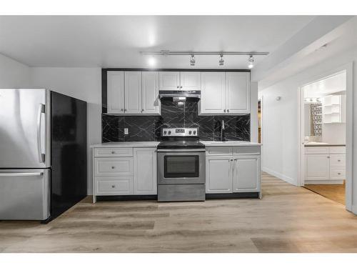 275 Rundlecairn Road Ne, Calgary, AB - Indoor Photo Showing Kitchen With Stainless Steel Kitchen