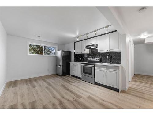 275 Rundlecairn Road Ne, Calgary, AB - Indoor Photo Showing Kitchen