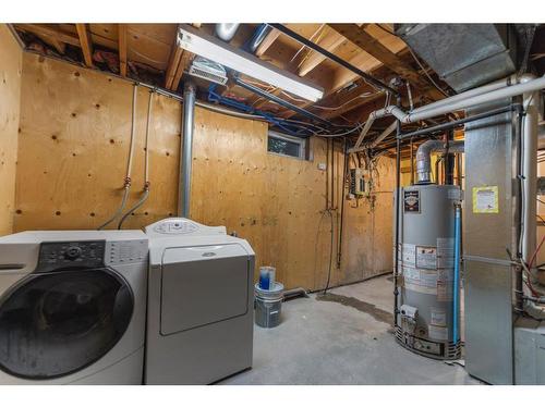 275 Rundlecairn Road Ne, Calgary, AB - Indoor Photo Showing Laundry Room