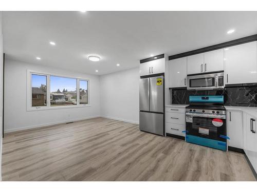 275 Rundlecairn Road Ne, Calgary, AB - Indoor Photo Showing Kitchen