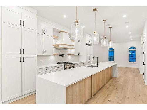 1917 21 Avenue Nw, Calgary, AB - Indoor Photo Showing Kitchen With Double Sink With Upgraded Kitchen