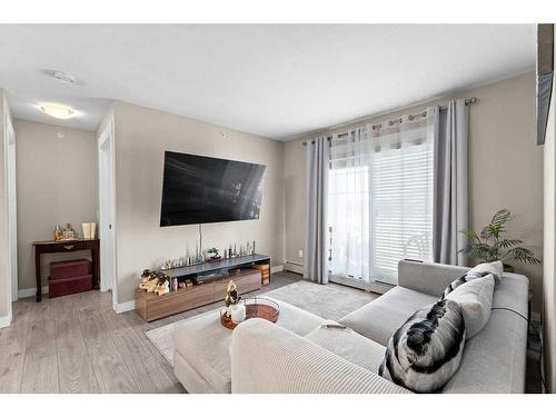 3407-11 Mahogany Row Se, Calgary, AB - Indoor Photo Showing Living Room