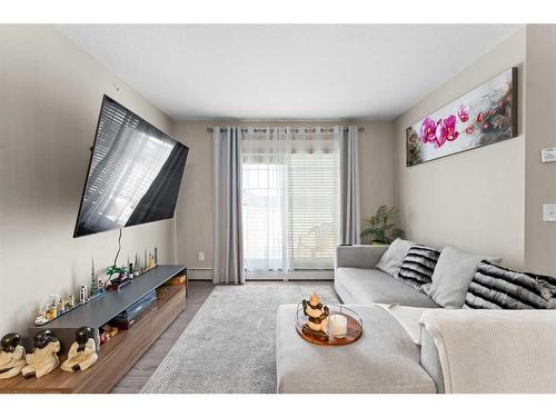 3407-11 Mahogany Row Se, Calgary, AB - Indoor Photo Showing Living Room